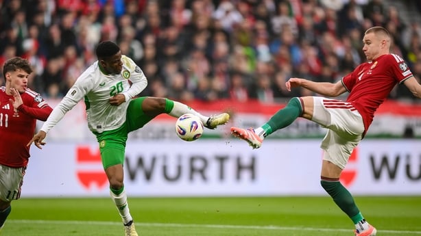 Chiedozie Ogbene of Republic of Ireland is fouled by Attila Szalai of Hungary, resulting in a Republic of Ireland penalty, during the FIFA World Cup 2026 Group F Qualifier match between Hungary and Republic of Ireland at Puskás Aréna in Budapest, Hungary.