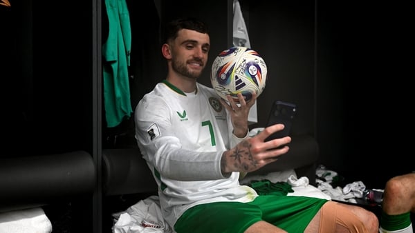 Troy Parrott celebrates in the dressing room after the FIFA World Cup 2026 Group F Qualifier match between Hungary and Republic of Ireland at Puskás Aréna in Budapest, Hungary.