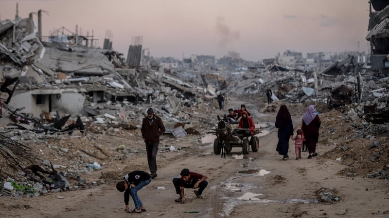 Palestinians who lost their homes continue to live among the rubble of destroyed buildings in northern Gaza's Jabalia Camp