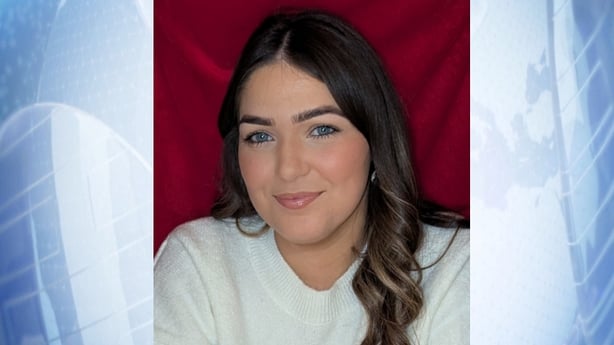 a photograph on a blue background of chloe mcgee