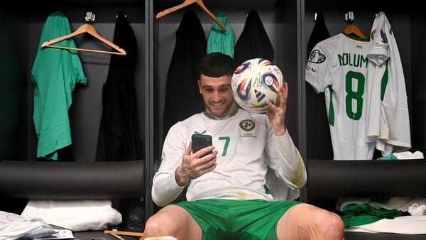 16 November 2025; Troy Parrott of Republic of Ireland celebrates with the match ball in the dressing room after scoring a hat-trick in the FIFA World Cup 2026 Group F Qualifier match between Hungary and Republic of Ireland at Puskás Aréna in Budapest, Hun