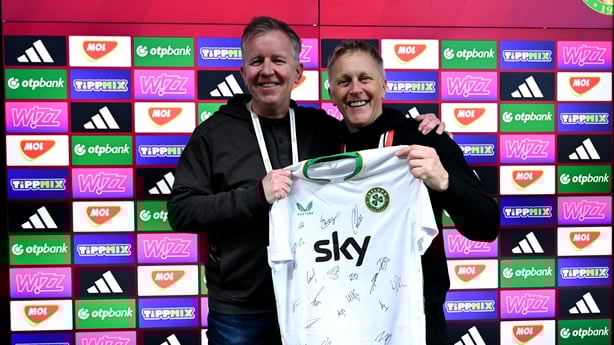 16 November 2025; Republic of Ireland head coach Heimir Hallgrimsson presents a signed Republic of Ireland jersey to retiring RTÉ sport journalist Ed Leahy after the FIFA World Cup 2026 Group F Qualifier match between Hungary and Republic of Ireland at Puskás Aréna in Budapest, Hungary. Photo by Ste