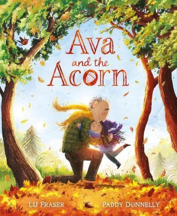 A book cover with a child and adult hugging under two trees and the text Ava and the acorn