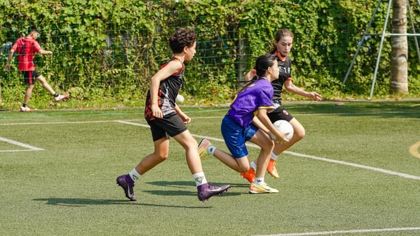 Young players play football at the Asian Youth Championship in Vietnam