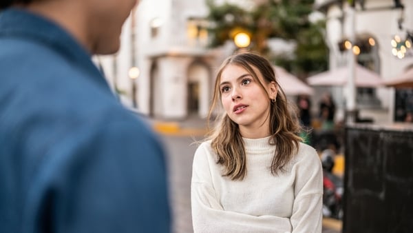 Young couple having an argument outdoors
