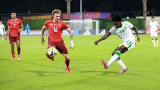 Ade Solanke of Republic of Ireland in action against Marco Correia of Switzerland during the 2025 FIFA U-17 World Cup Round of 16 match between Switzerland and Republic of Ireland at Aspire Zone in Doha, Qatar. (Photo By Nikola Krstic/Sportsfile via Getty