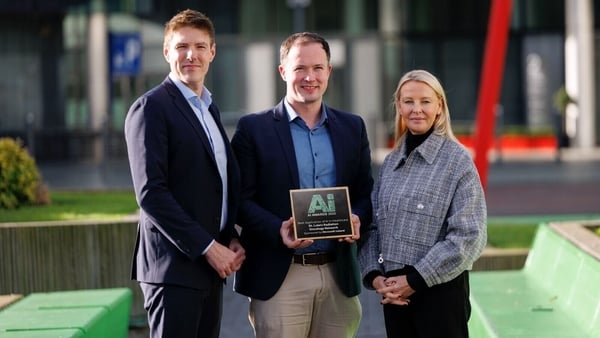 AI Ireland founder Mark Kelly stands with AI in Healthcare winner Ciaran Malone from St. Luke’s Radiation Oncology Network, and Microsoft Ireland General Manager Catherine Doyle
