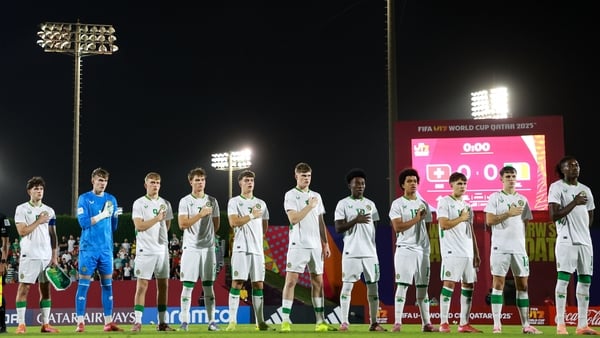 Republic of Ireland players stand for the playing of Amhrán na bhFiann before the 2025 FIFA U-17 World Cup Round of 16 match between Switzerland and Republic of Ireland at Aspire Zone in Doha, Qatar