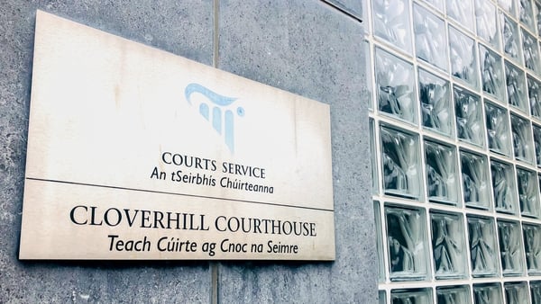 A sign on a building saying Cloverhill Courthouse