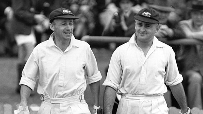 Donald Bradman and Stan McCabe walk to the crease in 1938