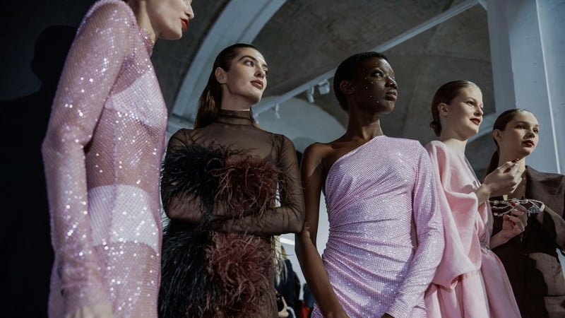 Mesh, feathers and sparkles are in for festive fashion 2025 (Alamy/PA)