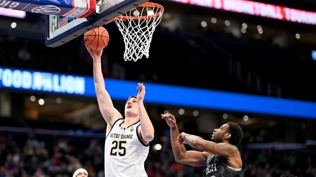 WASHINGTON, DC - MARCH 12: Matt Zona #25 of the Notre Dame Fighting Irish drives to the basket in the first half against Tyzhaun Claude #12 of the Georgia Tech Yellow Jackets in the First Round of the ACC Men's Basketball Tournament at Capital One Arena on March 12, 2024 in Washington, DC. (Photo by