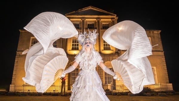 Performer outside Lucan House