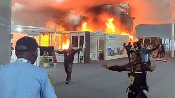 Emergency crews battling a fire that broke out at a pavilion inside the venue of the COP30