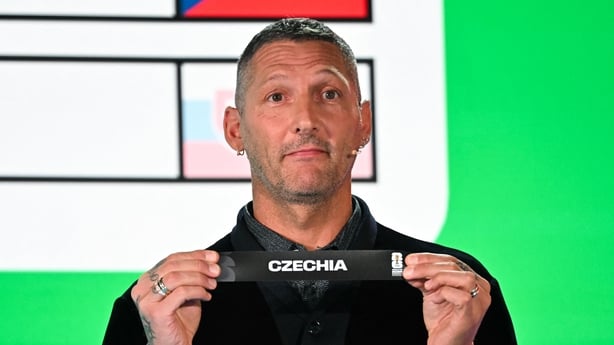 Italian former player Marco Materazzi shows the paper slip of Czechia during the 2026 FIFA World Cup European Play-Off draw at the FIFA's Home of Football in Zurich on November 20, 2025. (Photo by Fabrice COFFRINI / AFP)