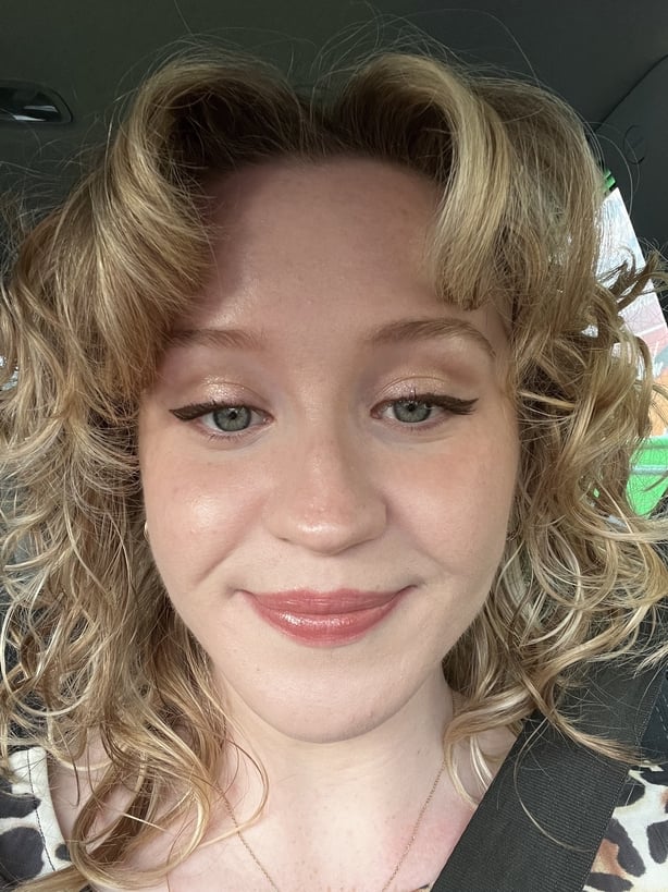 A selfie of a woman wearing makeup