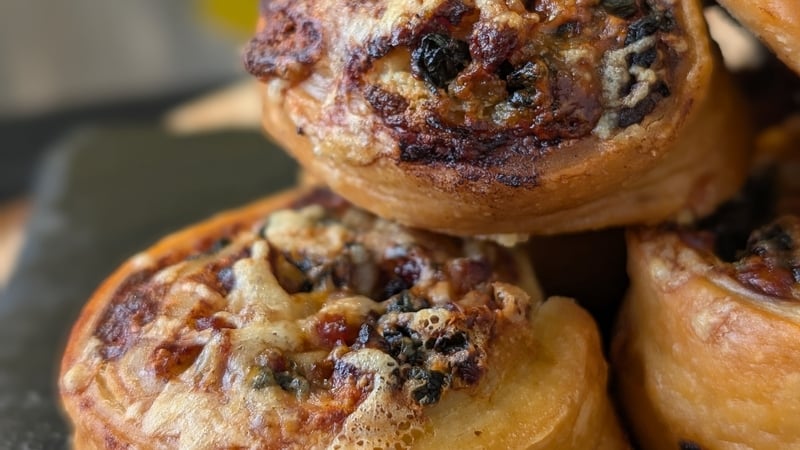 Alex Petit's bacon, cheddar & cream cheese puff wheels with roasted garlic aioli.