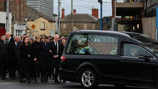 Family of Dylan Commins follow his coffin