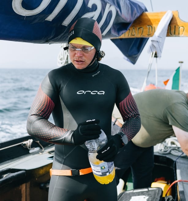 Daragh Morgan in swim gear in a boat