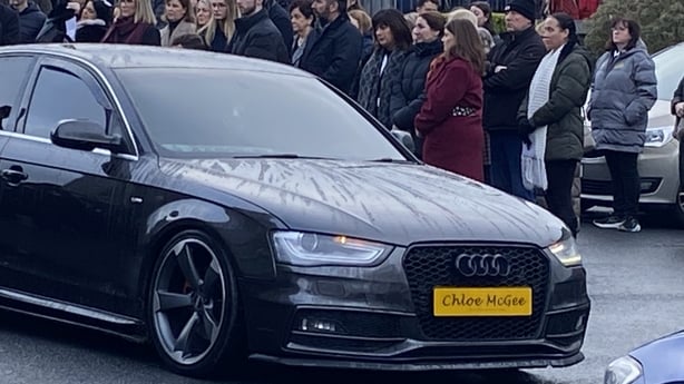 Car with Chloe McGee's name on the registration plate