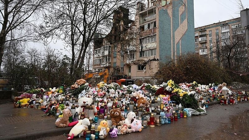 A makeshift memorial near a heavily damaged residential building in Ternopil, amid the Russian invasion of Ukraine
