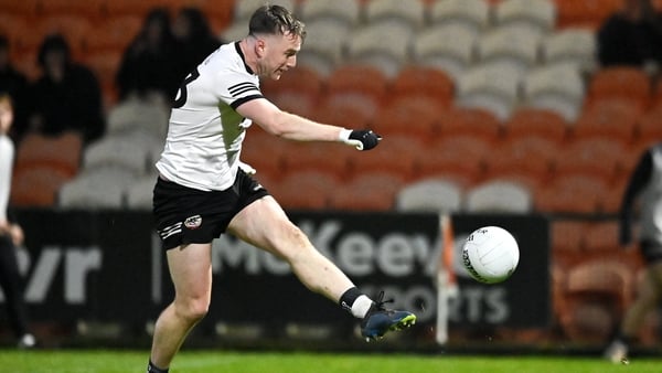 22 November 2025; Paul Devlin of Kilcoo shoots to score his sides first goal against Erne Gaels during the AIB Ulster GAA Football Senior Club Championship semi-final match between Erne Gaels Belleek and Kilcoo at BOX-IT Athletic Grounds in Armagh. Photo