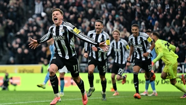 Harvey Barnes of Newcastle United (11) celebrates after scoring Newcastle's second goal during the Premier League match between Newcastle United and Manchester City at St James' Park on November 22, 2025 in Newcastle upon Tyne, England.