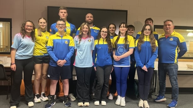 Logan Smyth with his swimming team