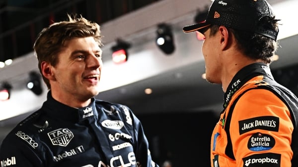 LAS VEGAS, NEVADA - NOVEMBER 22: Race winner Max Verstappen of the Netherlands and Oracle Red Bull Racing and Second placed Lando Norris of Great Britain and McLaren congratulate each other in parc ferme during the F1 Grand Prix of Las Vegas at Las Vegas