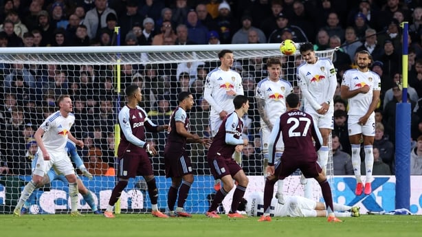 LEEDS, ENGLAND - NOVEMBER 23: Morgan Rogers of Aston Villa scores his team's second goal from a free kick during the Premier League match between Leeds United and Aston Villa at Elland Road on November 23, 2025 in Leeds, England. (Photo by Stu Forster/Getty Images)