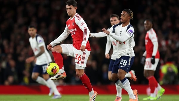 Martin Zubimendi of Arsenal controls the ball whilst under pressure from Wilson Odobert of Tottenham Hotspur during the Premier League match between Arsenal and Tottenham Hotspur at Emirates Stadium on November 23, 2025 in London, England. (Photo by Julia