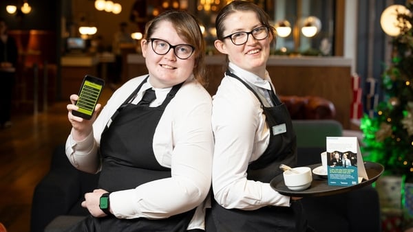Sisters Emma Connolly (left) and Kate Connolly at the Hyatt Centric Hotel, Dublin where they are using AssistiV technology to work.