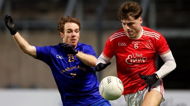 Gavin D'Auria of Eire Óg Ennis in action against Eoin McGreevy of St Finbarr's during the AIB Munster GAA Football Senior Club Championship semi-final match between Eire Óg Ennis and St Finbarr's at Supervalu Páirc Uí Chaoimh in Cork