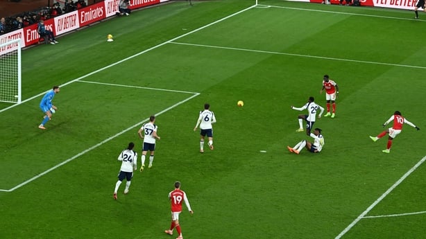 Eberechi Eze of Arsenal scores his team's fourth goal during the Premier League match between Arsenal and Tottenham Hotspur at Emirates Stadium on November 23, 2025 in London, England