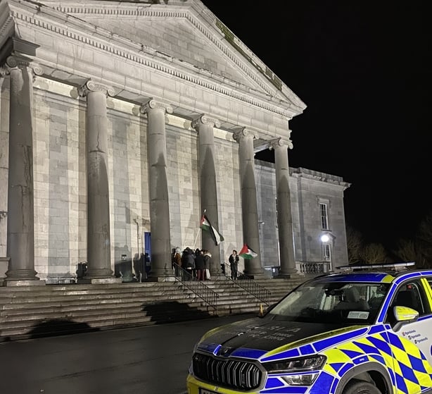 A garda car outside a court house