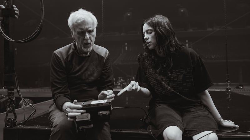 James Cameron and Billie Eilish look at their footage Photo: Henry Hwu