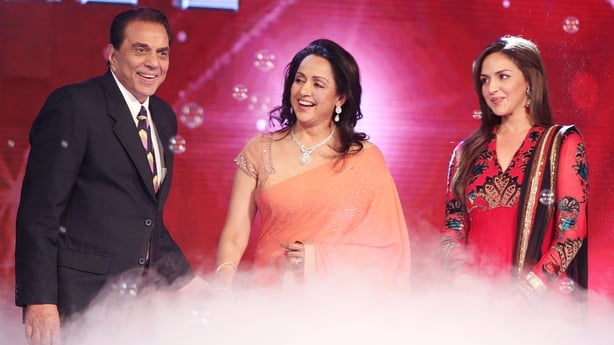 Dharmendra with his wife Hema Malini and their daughter Esha Deol on the set of India's Got Talent in Filmcity, Mumbai, in September 2011