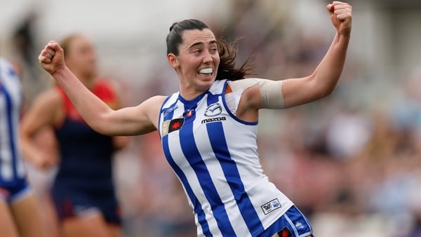 MELBOURNE, AUSTRALIA - NOVEMBER 22: Blaithin Bogue of the Kangaroos celebrates a goal during the 2025 AFLW First Preliminary Final match between the North Melbourne Tasmanian Kangaroos and the Melbourne Demons at Ikon Park on November 22, 2025 in Melbourn