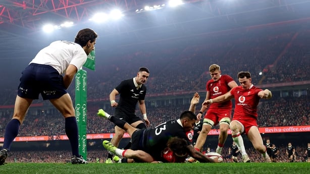 CARDIFF, WALES - NOVEMBER 22: (EDITORS NOTE: Image has been taken using a Remote Camera) Rieko Ioane of New Zealand scores his team's fourth try whilst being tackled by Dan Edwards of Wales during the Quilter Nations Series 2025 match between Wales and New Zealand at the Principality Stadium on Nove