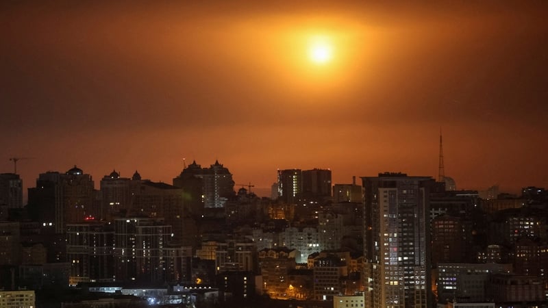 A Russian drone explodes in the sky over Kyiv during a Russian missile and drone strike