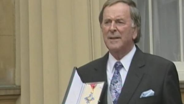 Broadcaster Terry Wogan is knighted, 2005