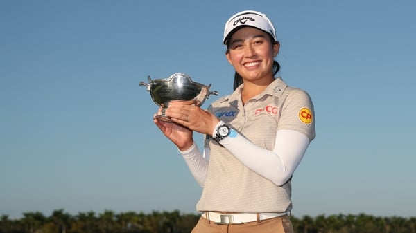 NAPLES, FLORIDA - NOVEMBER 23: Jeeno Thitikul of Thailand poses with the Glenna Collett Vare Trophy after her win during the final round of the CME Group Tour Championship 2025 at Tiburon Golf Club on November 23, 2025 in Naples, Florida. (Photo by Michae