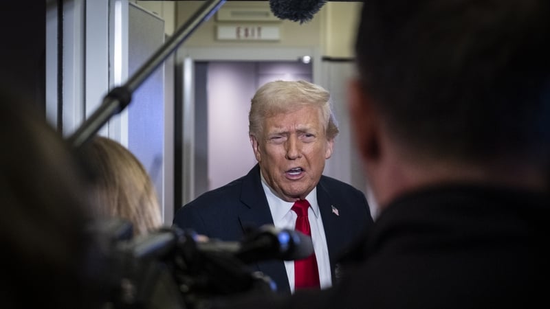 US President Donald Trump spoke to reporters aboard Air Force One