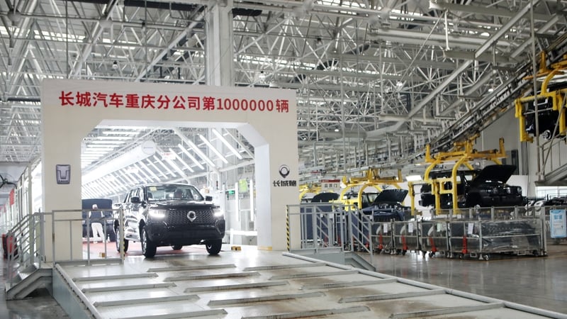 Newly-finished cars rolling off the production line at one of Great Wall Motors' factories in China