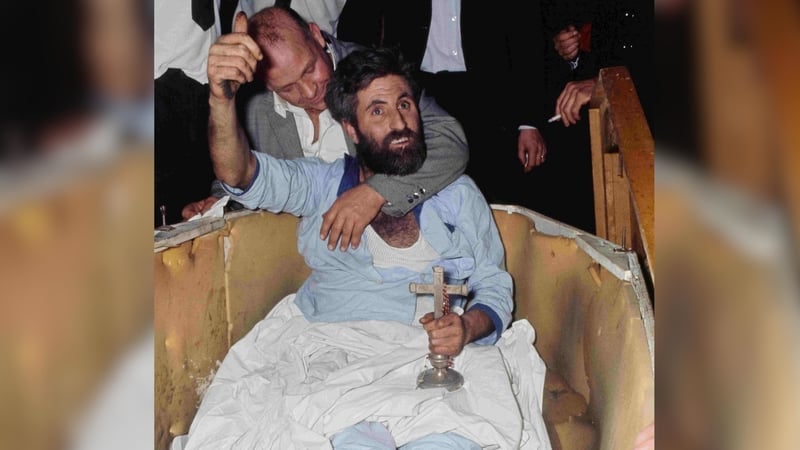 Michael Meaney pictured waving to the crowd after spending a record-breaking 61 days in an underground coffin