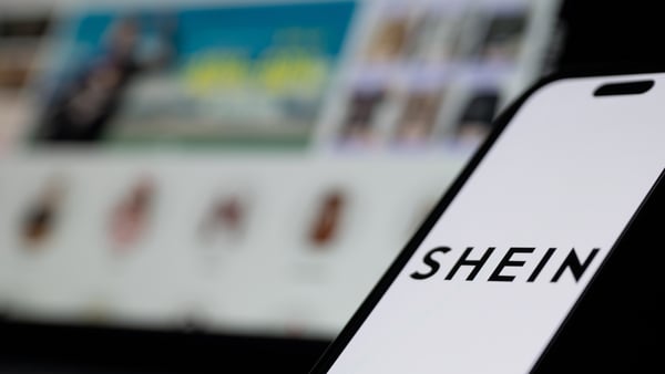 The Shein logo and website are displayed on computer and phone screens