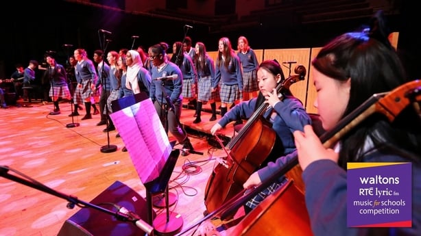 Post primary school students performing singing and double bass for the Waltons RTÉ lyric fm Music for Schools competition