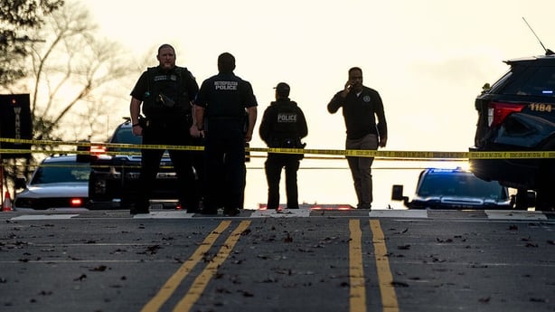 National Guard members put up police crime tape