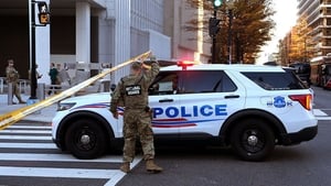 Two US national guard members shot near White House in Washington DC show image