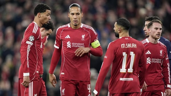 Liverpool's Virgil van Dijk (centre) and Mohamed Salah after Champions League loss to PSV, November 2025
